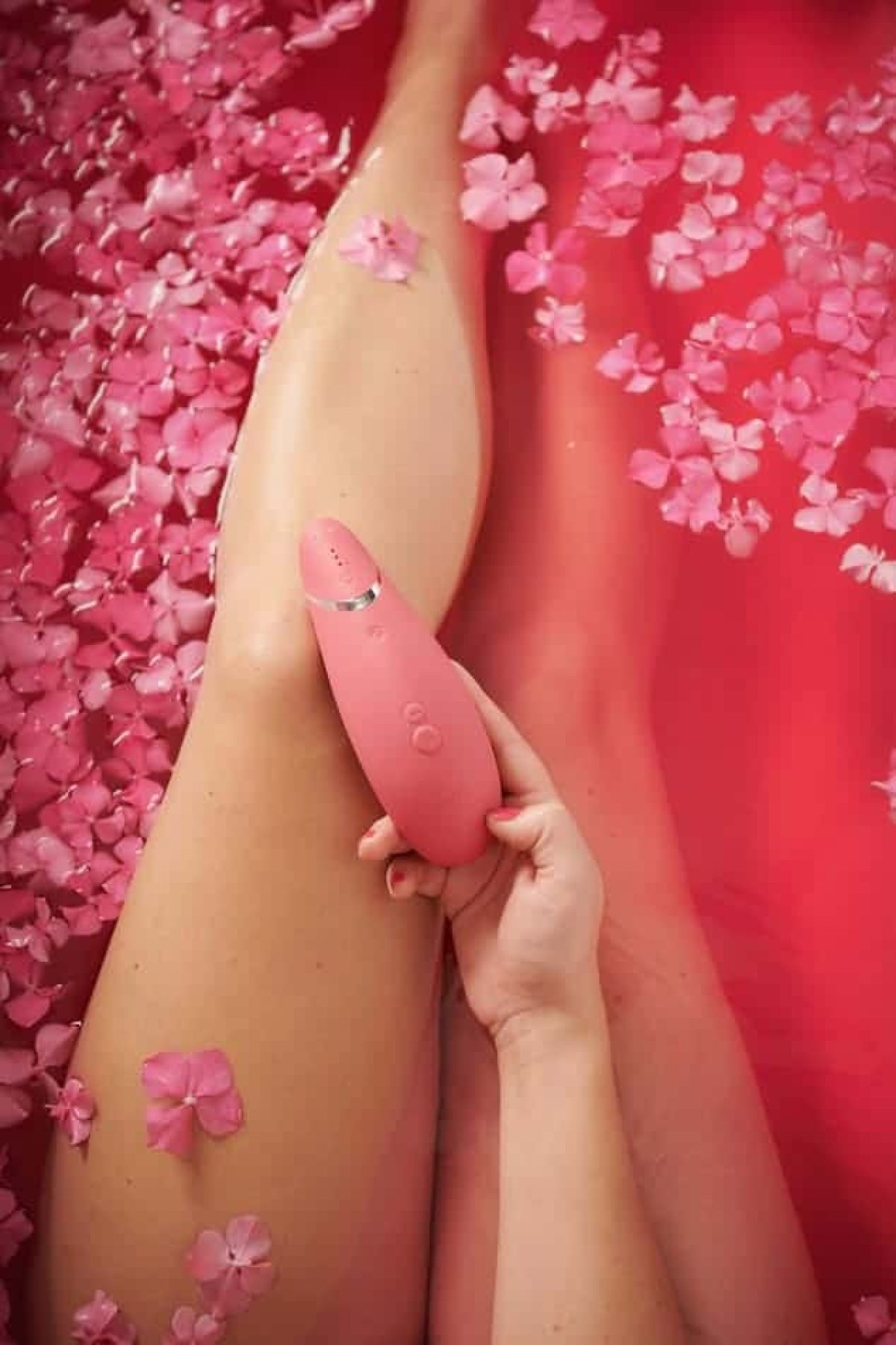 pink-vibrator-on-hand
